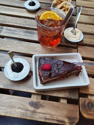 A piece of Chocolate Cake. at UNO Caffé Olistico in Bologna