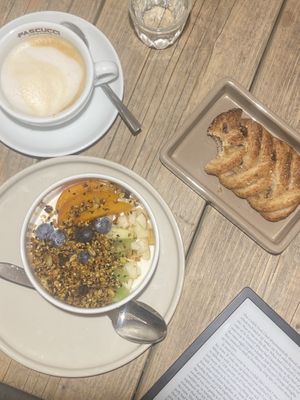 soy yoghurt with fruit and filled pastry   at UNO Caffé Olistico in Bologna