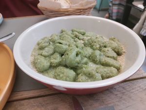 Hemp seed pesto gnocchi at UNO Caffé Olistico in Bologna
