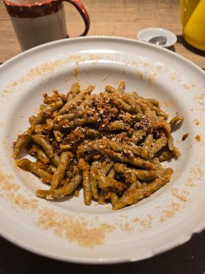 Strozzapreti pasta with soy ragù at UNO Caffé Olistico in Bologna