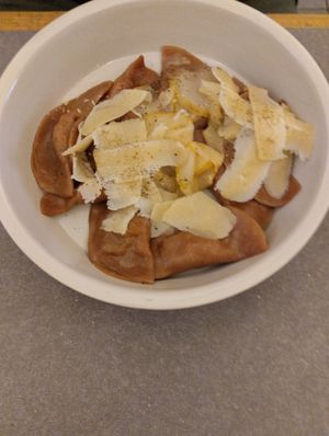 Fresh pasta with vegan parmigano at UNO Caffé Olistico in Bologna