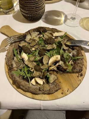 Truffle pizza with 7 cereals bread and vegan cheese  at Zetta in Saint-tropez