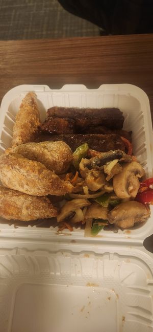 Drummies, ribs and mushroom salad at Dodah's Kitchen in Baltimore
