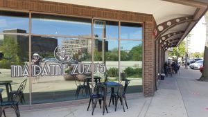 Outdoor seating in front & along the side. Across the street from First Bank of Highland Park. at Madame Zuzu's in Highland Park