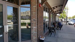 Entrance & outdoor seating. Next door to Once Upon a Bagel. at Madame Zuzu's in Highland Park