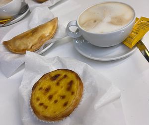 Vegan empanada, vegan pastel, and oat cappuccino  at Mourapão  in Vilamoura