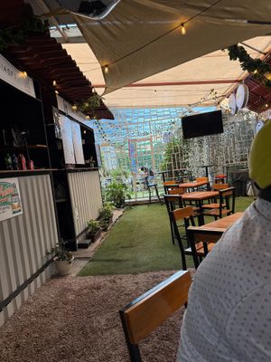 Seating area (covered outdoor) at El Monchis Vegano in Mexico City
