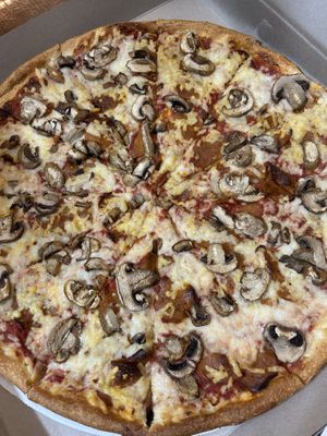 Vegan cheese, vegan pepperoni, mushroom  at Zois Pizza in Seymour