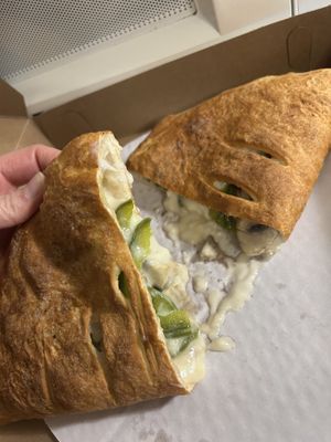 Mushroom and pepper calzone  at Zois Pizza in Seymour