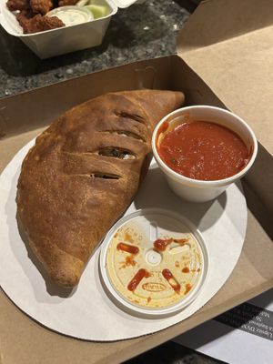 Mushroom calzone  at Zois Pizza in Seymour