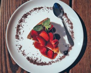 APHRODITE Cheesecake 								
Organic – Sugar free - Gluten free. Vegan cheesecake with coconut and homemade cashew cream, dates, and homemade strawberry jam.
 at Hippocrates Healthy Eatery in Randwick