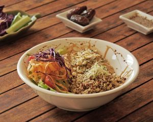 APOLLO
Red lentils w/ jack fruit marinated in lime, ginger & satay sauce (Peanut, coconut cream, red curry and soy), served w/ quinoa, romaine lettuce, broccoli sprouts and carrots at Hippocrates Healthy Eatery in Randwick