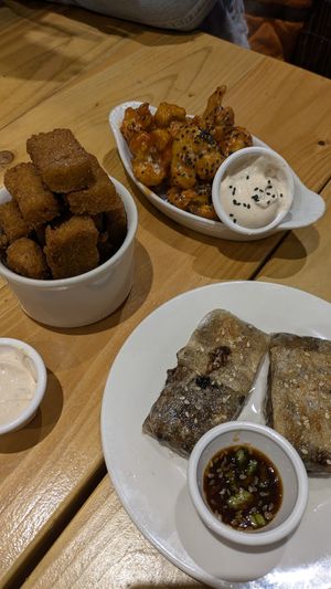 Starters (polenta, Vietnamese rolls and cauliflower) at Karibu Vegan Bar & Kitchen in Stroud