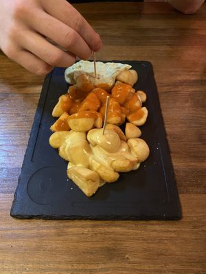 Pataques 3 salses (Potatoes w 3 sauces) at Cerveceria La Raposa in Oviedo