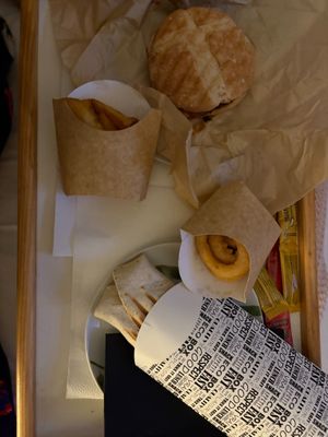 Onion rings, fries, wrap and hamburger at Cerveceria La Raposa in Oviedo