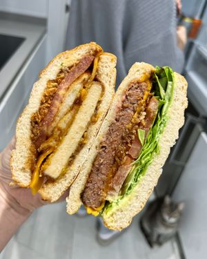 Delivered juicy vegan burgers: U.H.P. (left) and 1.3.1.2. at Cerveceria La Raposa in Oviedo