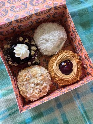 Special Donuts Mai: Bienenstich, Blueberry Lemon Cake, Caramel Almond Coconut und Peanut Butter Jelly😍 at Brammibal's Donuts - Alexanderplatz in Berlin