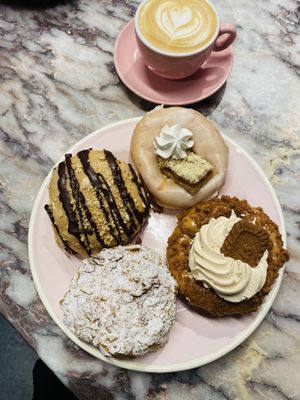 Bienenstich / Apple Pie / Biscoff / Peanut Caramel Chocolate at Brammibal's Donuts - Alexanderplatz in Berlin