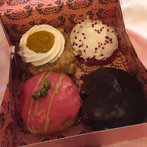 Streusel, red velvet, pistachio and Boston cream  at Brammibal's Donuts - Alexanderplatz in Berlin
