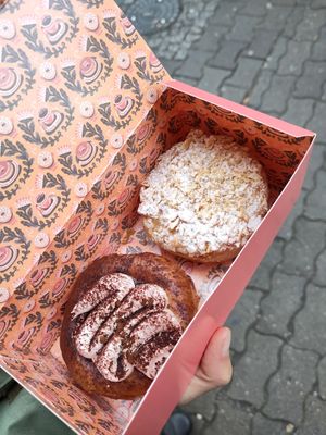 Left= tiramisu, right= almond topping and vanilla cream at Brammibal's Donuts - Alexanderplatz in Berlin