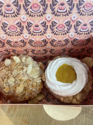 Bienenstich (left) & mango cheesecake (right)  at Brammibal's Donuts - Alexanderplatz in Berlin
