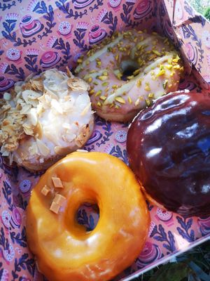 Bienenstich, Nougat Pistachio, Boston Cream & Salted Caramel at Brammibal's Donuts - Alexanderplatz in Berlin