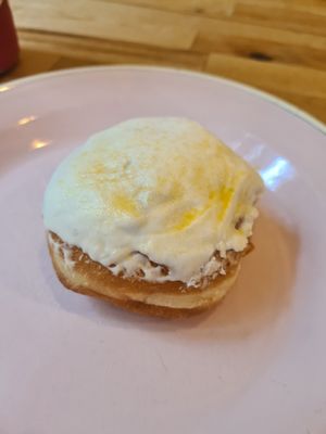 Passionfruit donut with passionfruit curd at Brammibal's Donuts - Alexanderplatz in Berlin