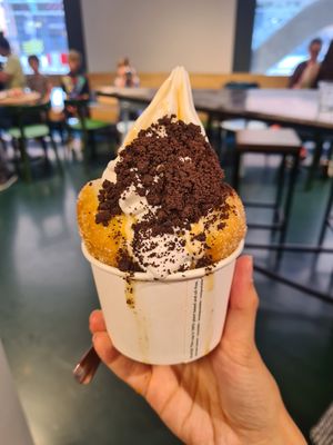 Oatly soft serve, served in a donut! at Brammibal's Donuts - Alexanderplatz in Berlin