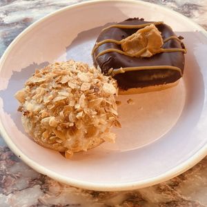 Bienenstich and Peanut Fudge Choccolate  at Brammibal's Donuts - Alexanderplatz in Berlin