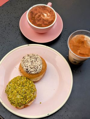 Pistachio donut and chai latte 💚 at Brammibal's Donuts - Alexanderplatz in Berlin