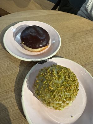 Chocolate and vanilla donut  🍩 and pistachio donut 😍  at Brammibal's Donuts - Alexanderplatz in Berlin