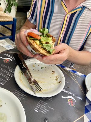 Vegan pitta - a vegan veggie type patty with salad and chips  at Mom's Kitchen in Kos