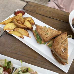 Breakfast sandwich with wedges  at Lettuce Love Cafe in Burlington