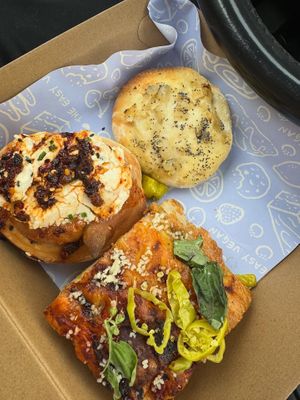 Savory Rolls & Tomato Focacia (on the left is The Chili Oil Roll... So Good!)  at The Easy Vegan - Food Truck in Denver