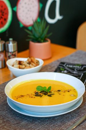 Pumpkin cream soup with coconut milk at Nom Nom in Constanta