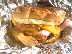 Un-CAJ-UN Animal
Chick-N (soy), Cheddar, Fries, 
VEG-Pickles, VEG-Onions, VEG-N Cheesy,
& Housemade Cajun VEG-Sauce, on Brioche at Veg-n in Okemos