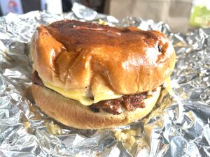Olive Burger
House Olive Sauce and chopped green olives generously served on a meaty burger with melted provolone cheese & pickles, on a toasted brioche bun. at Veg-n in Okemos