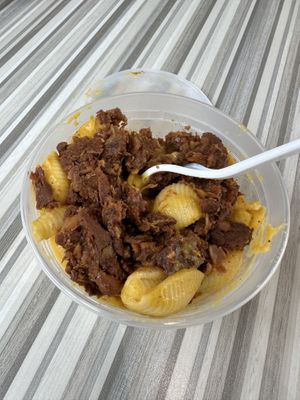 Vegan Mac and cheese with vegan brisket on top  at Veg-n in Okemos
