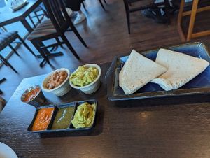 All the trimming that come with fajitas, plus extra refried beans ands avocado at Amigos Mexican Kitchen in Sheffield