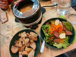 Fondue, bread and veggies at Pistache et Cacahuète in Lille