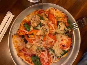 Pan crust pizza with red sauce, veggies and vegan cheese. at Peddlers Pizza Pub in Valparaiso