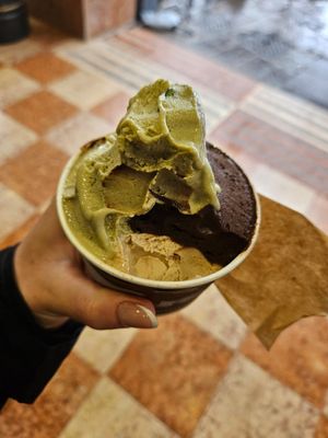Hazelnut on the bottom, fondonte and pistachio on top, huge serving and so tasty!! at Il Gelato Dei Masters in Desenzano Del Garda