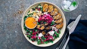 Middle East Bowl
Hummus, roasted aubergine, quinoa, kale, tomato, pickled red cabbage, pomegranate and za’atar. Served with falafel and Muhammara dip.  at Fafelle in Stockholm