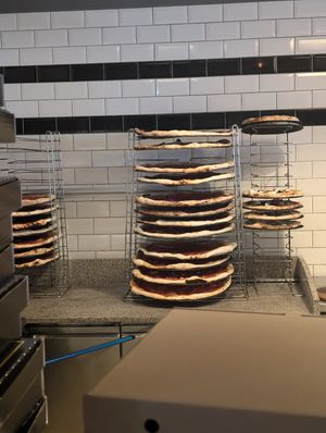 The "small" pizzas may seem tiny in comparison, but no: the large ones are just HUGE! at Fat Toni's Pizzeria in Stroud