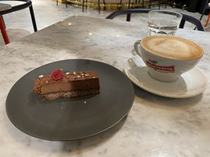 Chocolate cake snd latte at Kafé Plattan in Stockholm