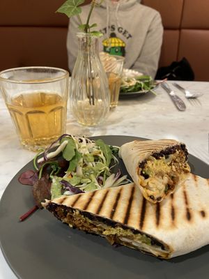 morning brunch avocado wrap with kombucha drink  at Kafé Plattan in Stockholm