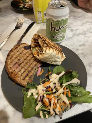 We shared a grilled tofu banh mi sandwich and  a grilled teriyaki “chicken” wrap.   at Kafé Plattan in Stockholm