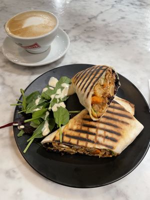 Buffalo cauliflower wrap and cappuccino   at Kafé Plattan in Stockholm
