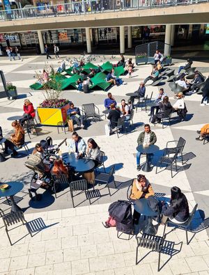 There are tables and chairs...  at Kafé Plattan in Stockholm