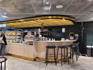 I side at Kafé Plattan in Stockholm